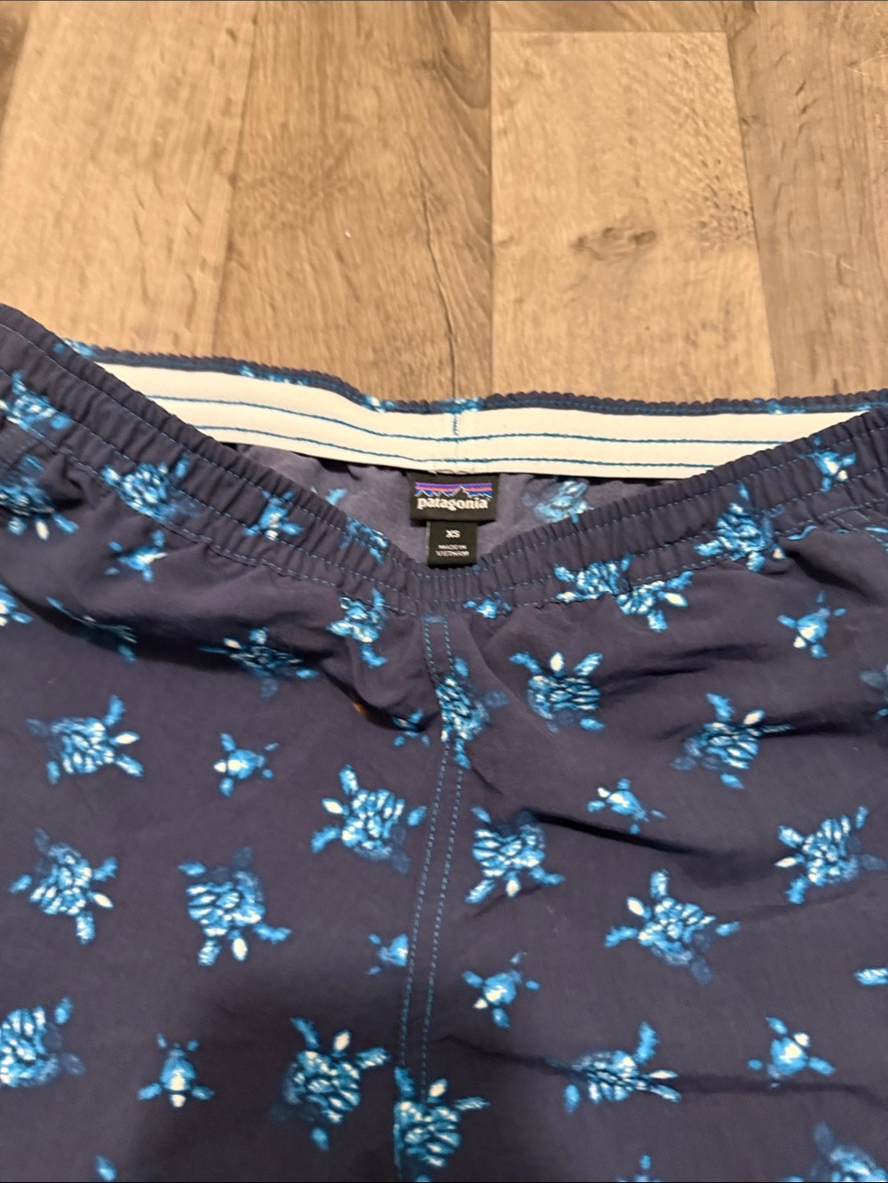 Patagonia Navy Swim Shorts with Bright Blue Turtle Print